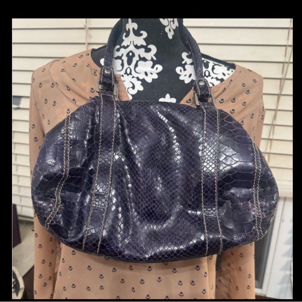 Dark purple real leather shoulder bag, made in Italy. Around 20-25 years old,